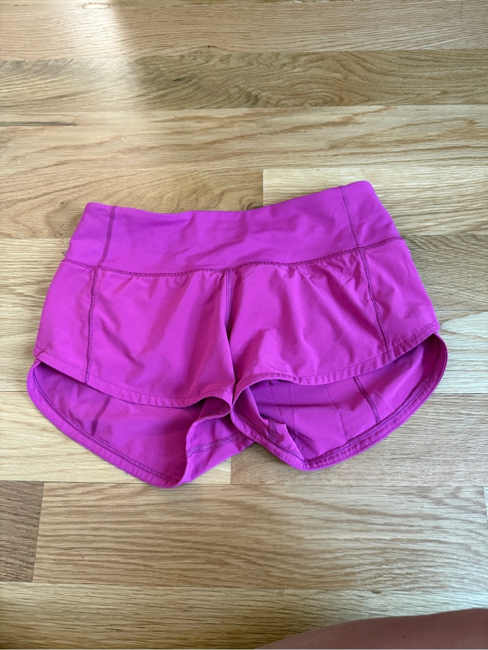 Pink lululemon speed up shorts
